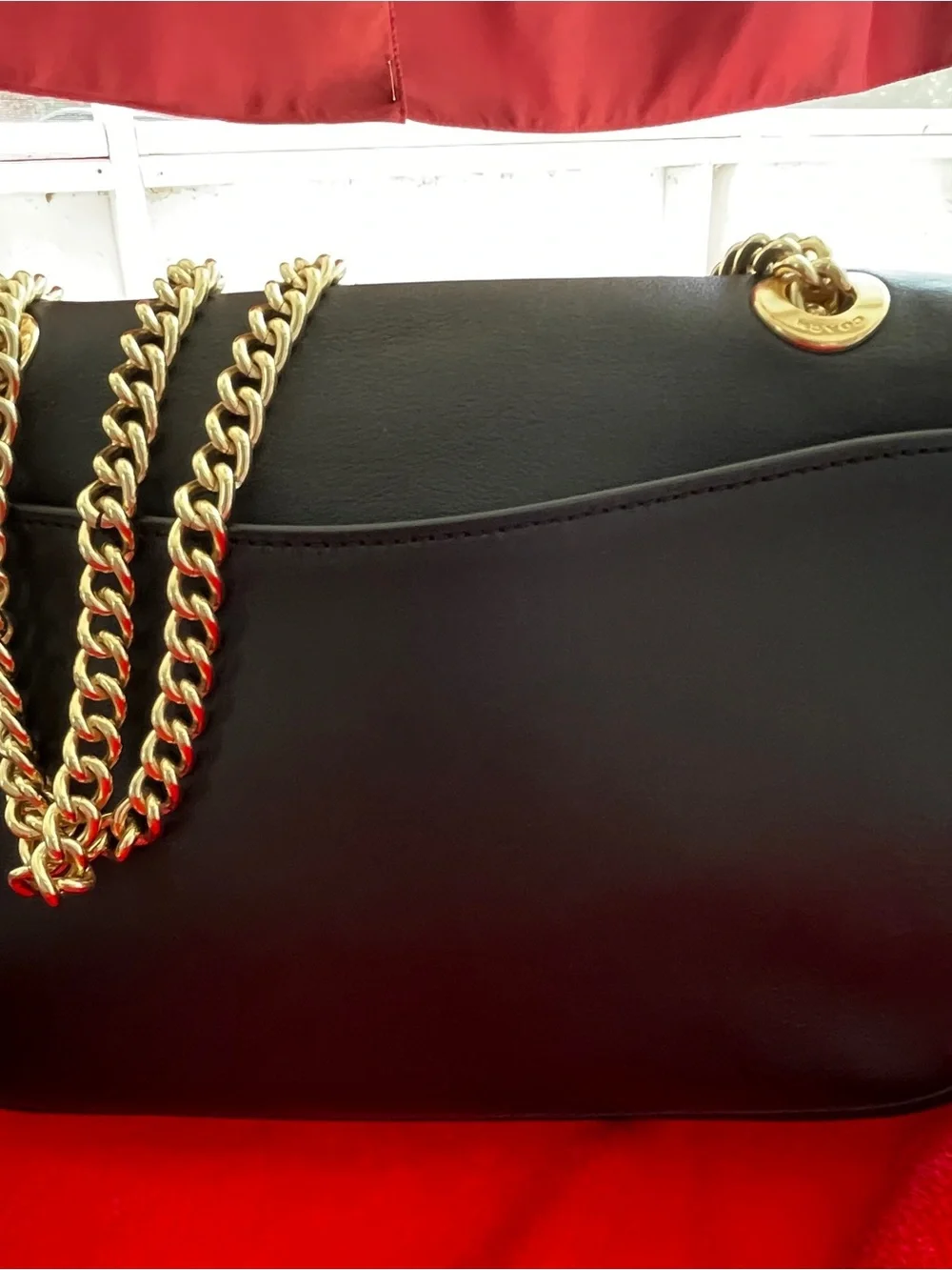 Coach Black Leather Shoulder Bag with Gold Chain Strap and Turnlock
